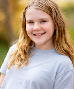 Raina HEADSHOT.